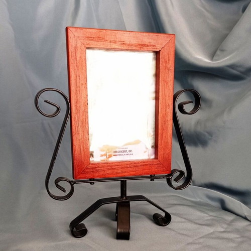 Rotating wooden photo frame with metal decorative base like new