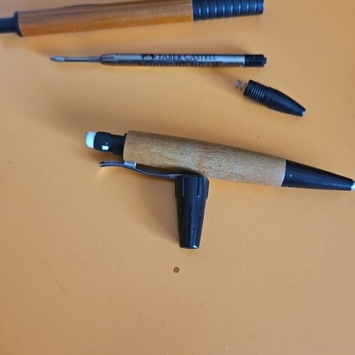 Faber Castell mechanical pencil and pen made of wood like new