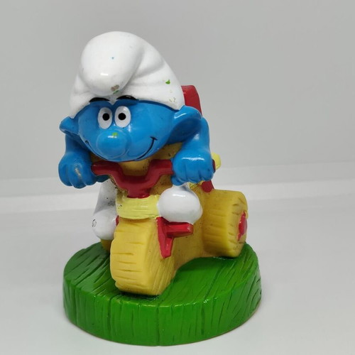 Smurf collectible figure on bicycle handmade Peyo like new