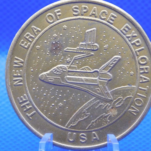 Commemorative metal token with space shuttle, USA