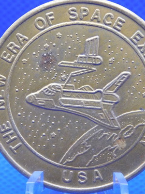 Commemorative metal token with space shuttle, USA