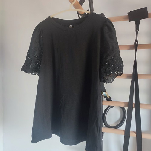 Black blouse with embroidered sleeves