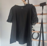 Black blouse with embroidered sleeves