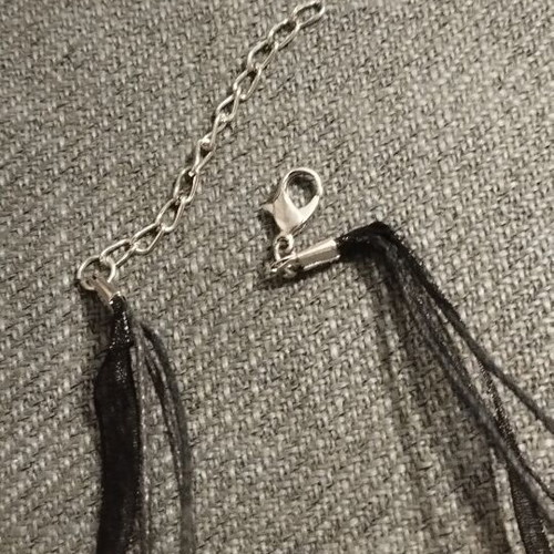 Women's necklace with large black stone cross and organza ribbon, like new