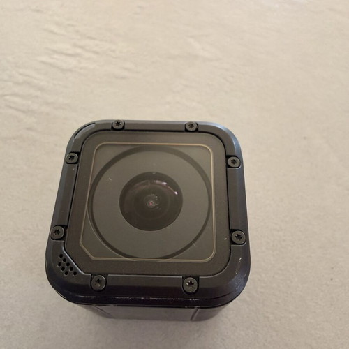 GoPro HERO4 Session action camera used with accessories and head strap
