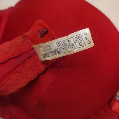 Bra used red with straps decorated with rhinestones