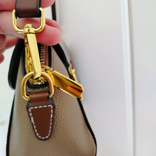 Shoulder bag made of synthetic leather like new, beige and brown