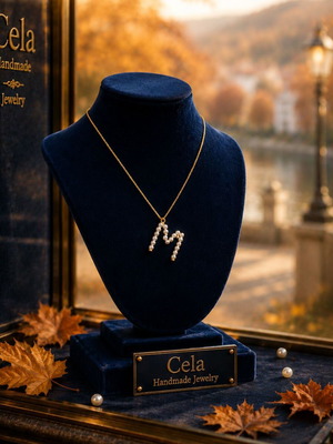 Pearl monogram necklace with stainless steel chain, letter M