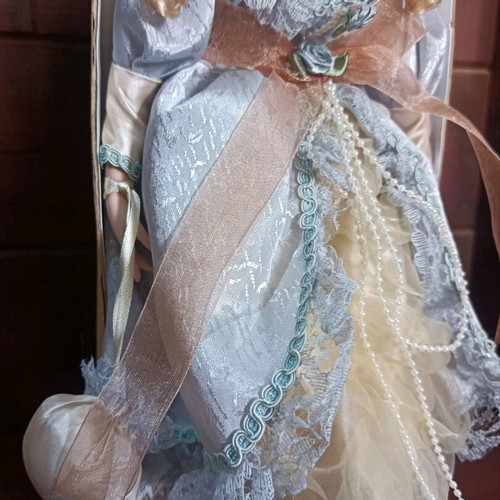 Porcelain doll with stand new, vintage style