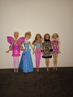 Barbie and Disney dolls used with minor defects