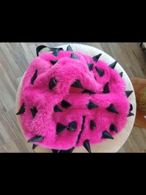 Madpax backpack used, furry with strap defect and spikes