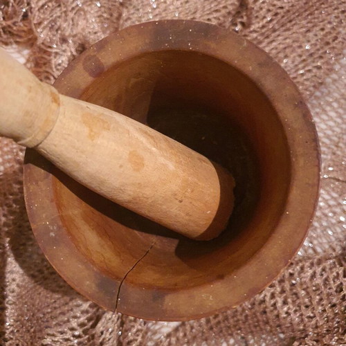 Wooden mortar used with crack, for decoration
