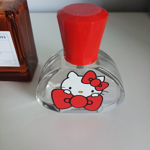 Empty Korres and Hello Kitty cologne bottles used for collection