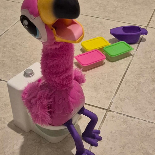 Flamingo Gotta Go interactive toy used, pink plush with electronic head