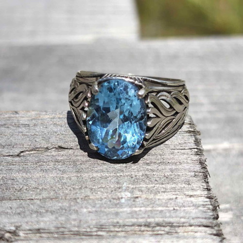 Silver ring with blue topaz new, size 7.5