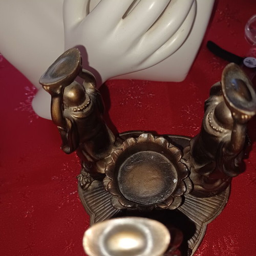 Asian candlestick with 3 smiling figures used, bronze finish