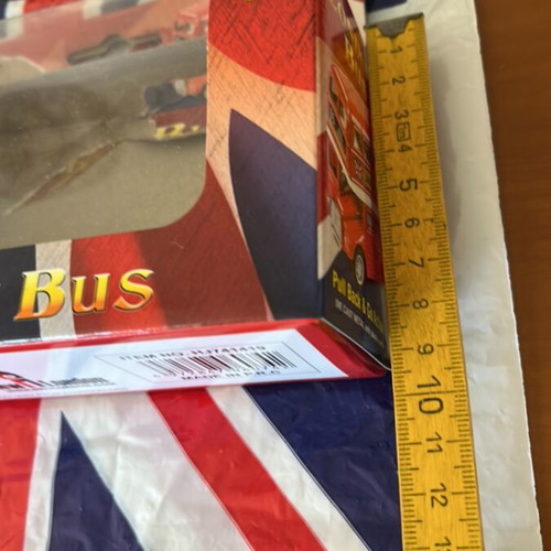 Plastic bag with English flag and small empty London bus box like new
