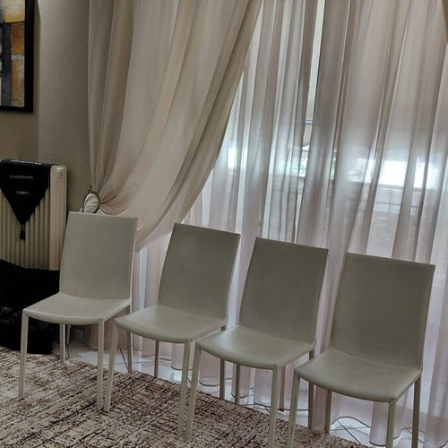 Leather chairs used, white with metal frame, set of 4