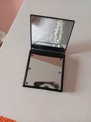 Compact mirror unused