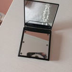 Compact mirror unused