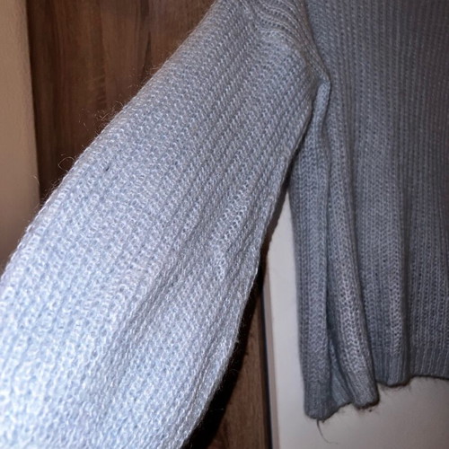 Blue knitted sweater