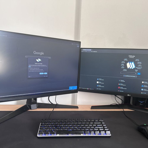 Gaming setup with 2 monitors and peripherals