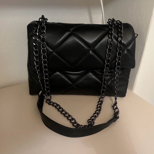 Black bag with multiple compartments