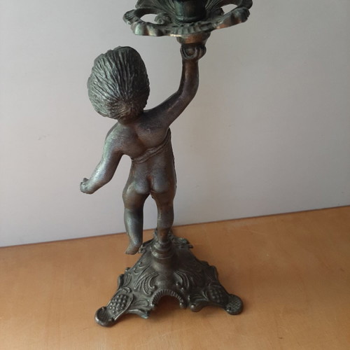 Vintage metal candlestick with boy figure like new
