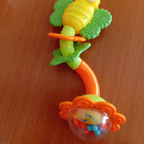 Rotating Rattle like new with sound and transparent base