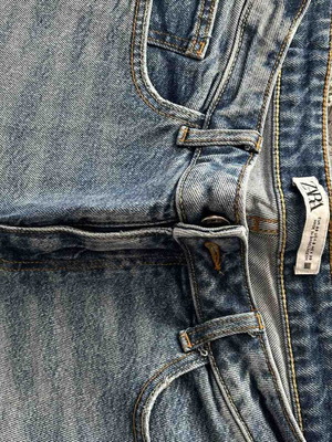 Zara women's straight-leg denim jeans with rips like new