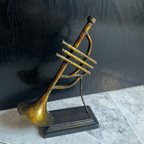 Vintage brass decorative musical instrument with black base, 30 cm