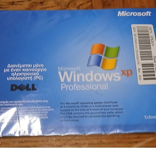 Windows XP Professional Service Pack 2 Genuine Dell sealed reinstall CD like new