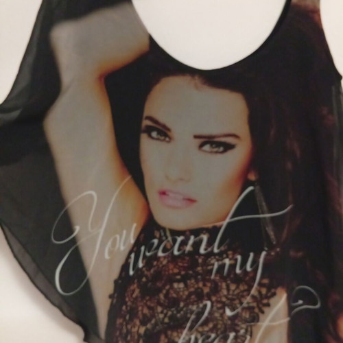 Black asymmetrical blouse with transparent chiffon and print Garantie used