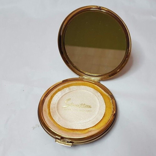 Stratton vintage powder compact used with glass surface and metal base