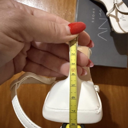 Envie white sandals with unique heel