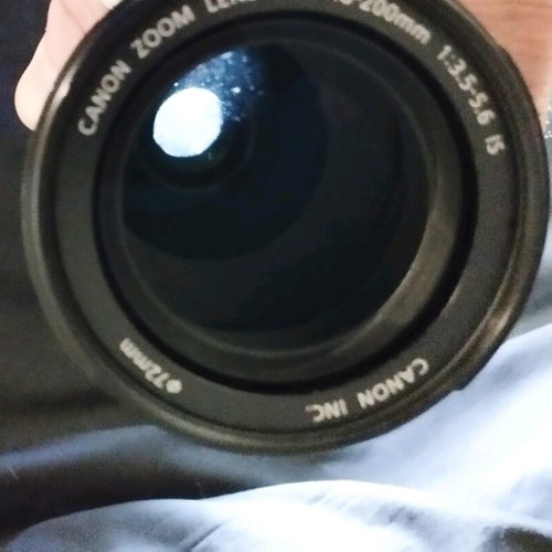 Canon 18-200 f3.5-5.6 IS lens used with filter and hood