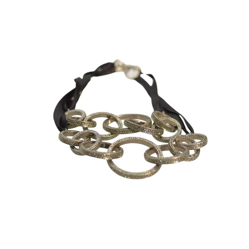 Michael Teperson necklace with black ribbon, silver tone rings and crystals used