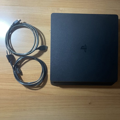 PlayStation 4 console with 2 controllers, NBA 2K25, FIFA 20, Minecraft