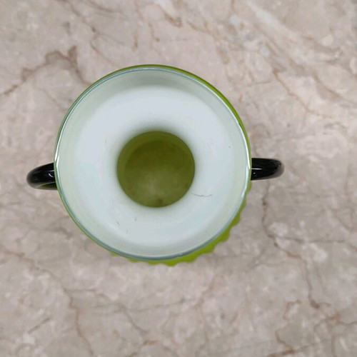 Vintage retro green glass vase like new with black handles