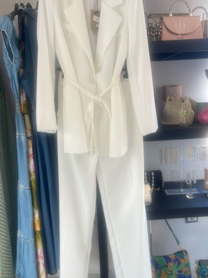 White women's suit set with jacket and trousers, new