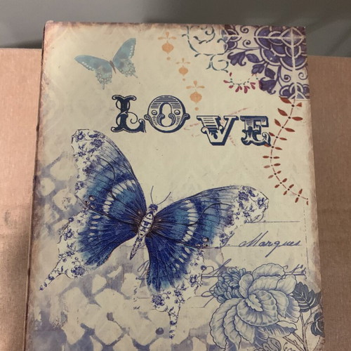 Vintage storage box with butterfly and flower design
