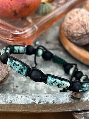 Unisex bracelet brand new, adjustable size, black and turquoise