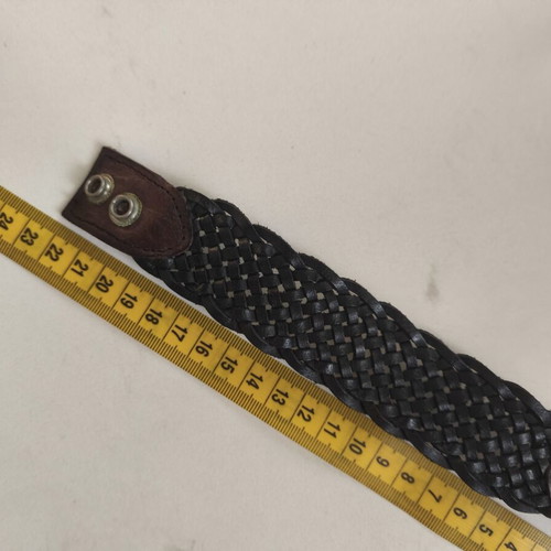 Leather bracelet used, black with brown details, sturdy weave
