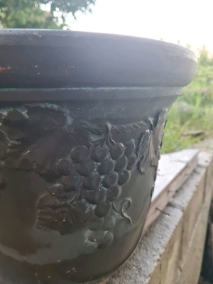 Ceramic planter used with embossed design