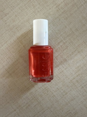 Essie nail polish new, red/coral with pearly shine