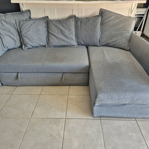 IKEA HOLMSUND corner sofa bed used with storage and washable covers