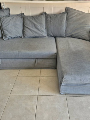 IKEA HOLMSUND corner sofa bed used with storage and washable covers