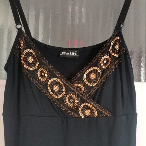 Spaghetti strap top used, black with gold embroidery, size small