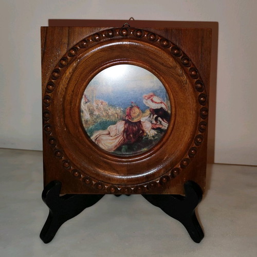 Miniature painting used in wooden frame