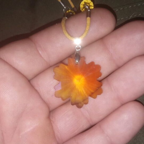 Handmade necklace with amber beads and leaf pendant